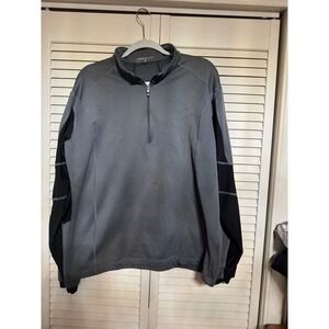 Nike Golf men's 1/4-zip pullover in gray with‎ black sleeves.